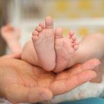 https://emerging-europe.com/wp-content/uploads/2020/08/bigstock-baby-feet-in-parent-hands-fat-368520337-1024x683.jpg